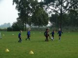 S.K.N.W.K. JO7-1 - M.Z.C. '11 JO7-1 (oefen) najaar seizoen 2021-2022 (3/33)